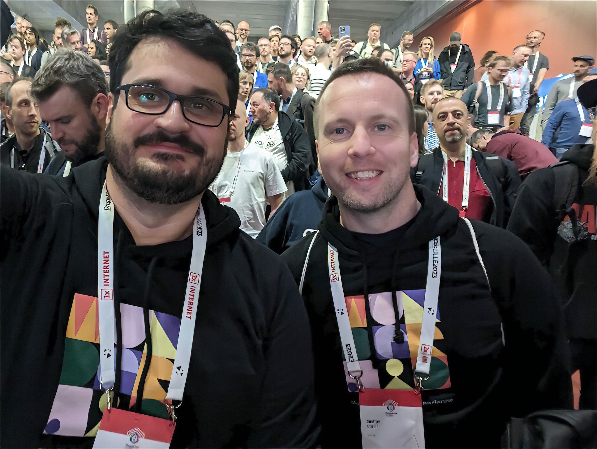 Mario and Joshua in DrupalCon Lille 2023 auditorium