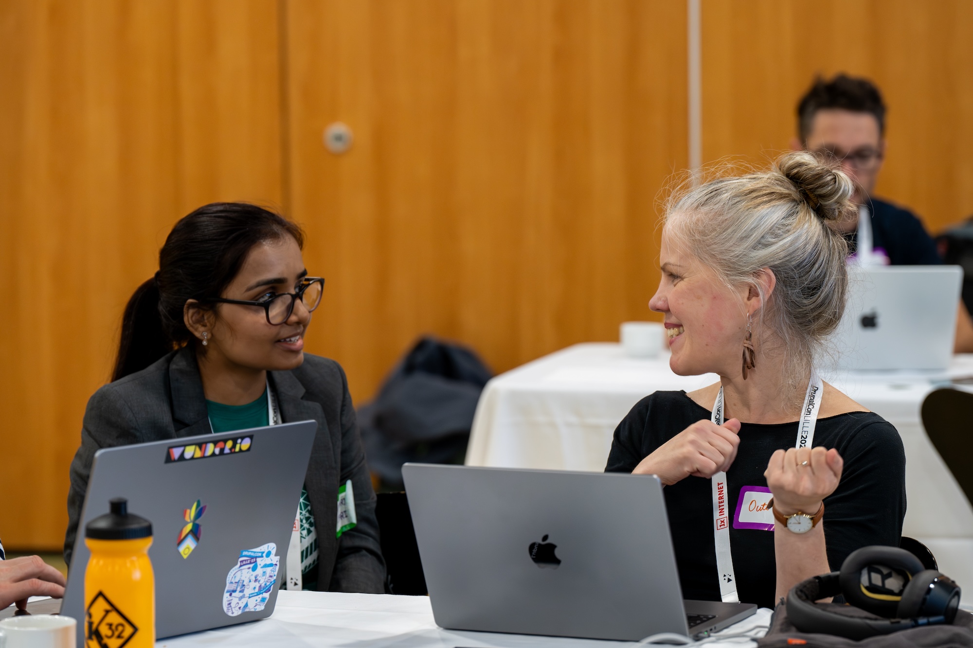 Outi talking with another event participant
