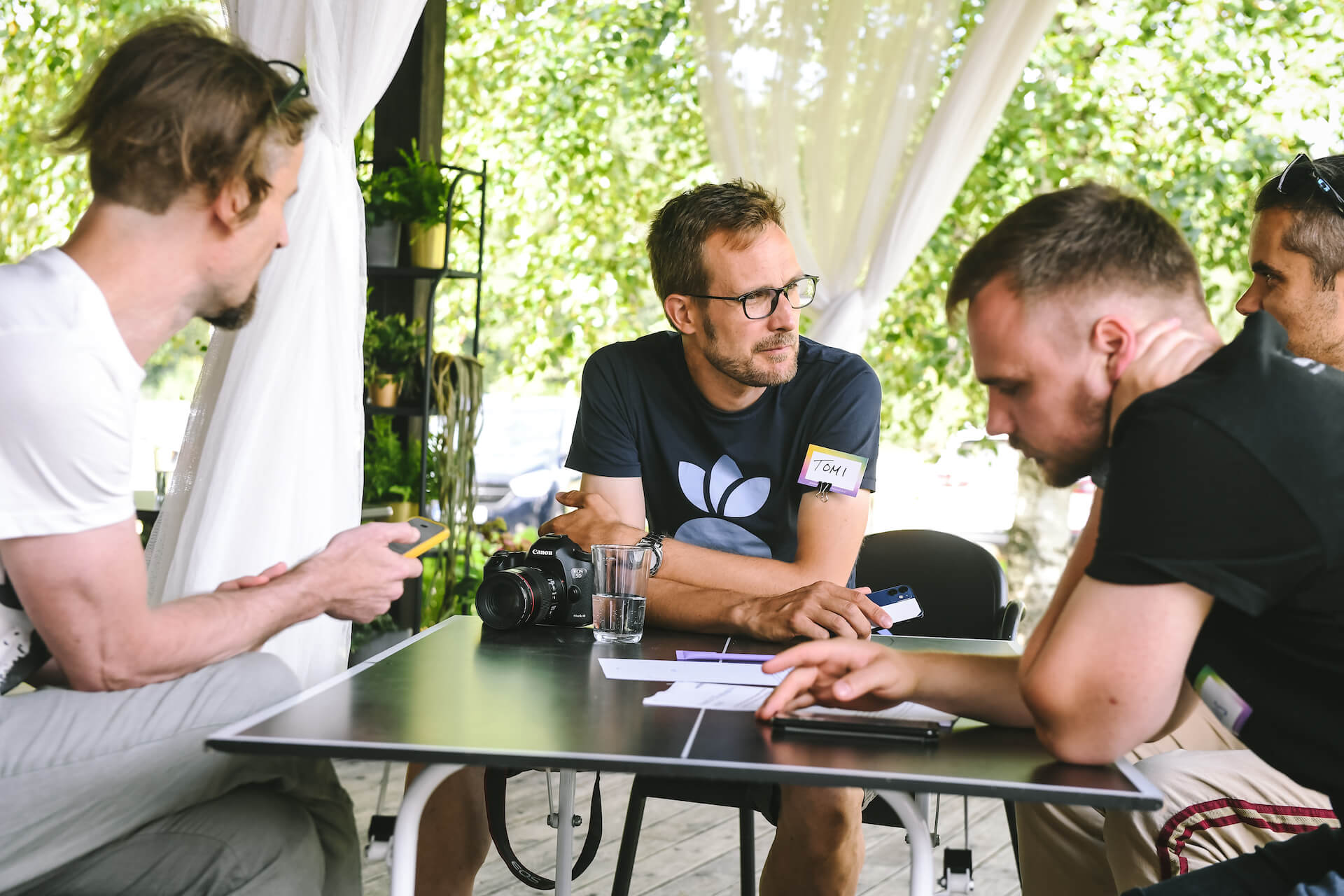 Team members collaborating in a workshop