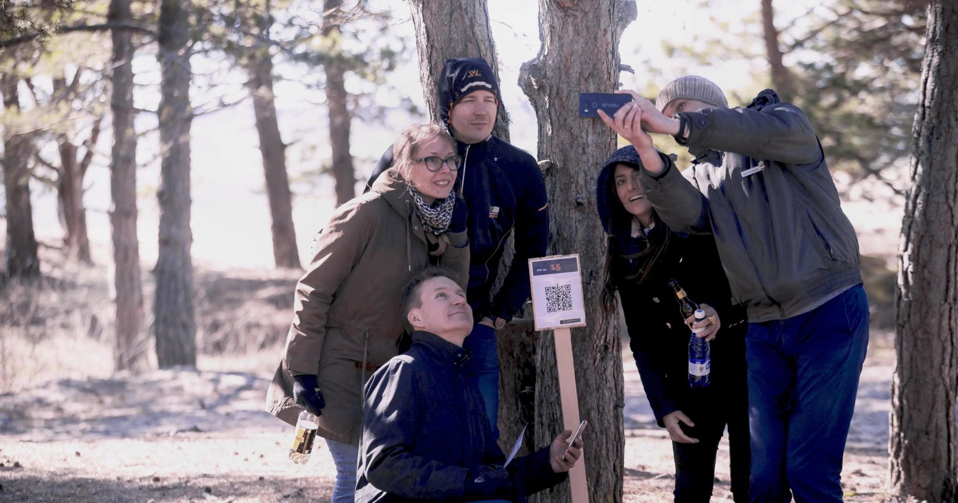 Group of people taking a selfie.