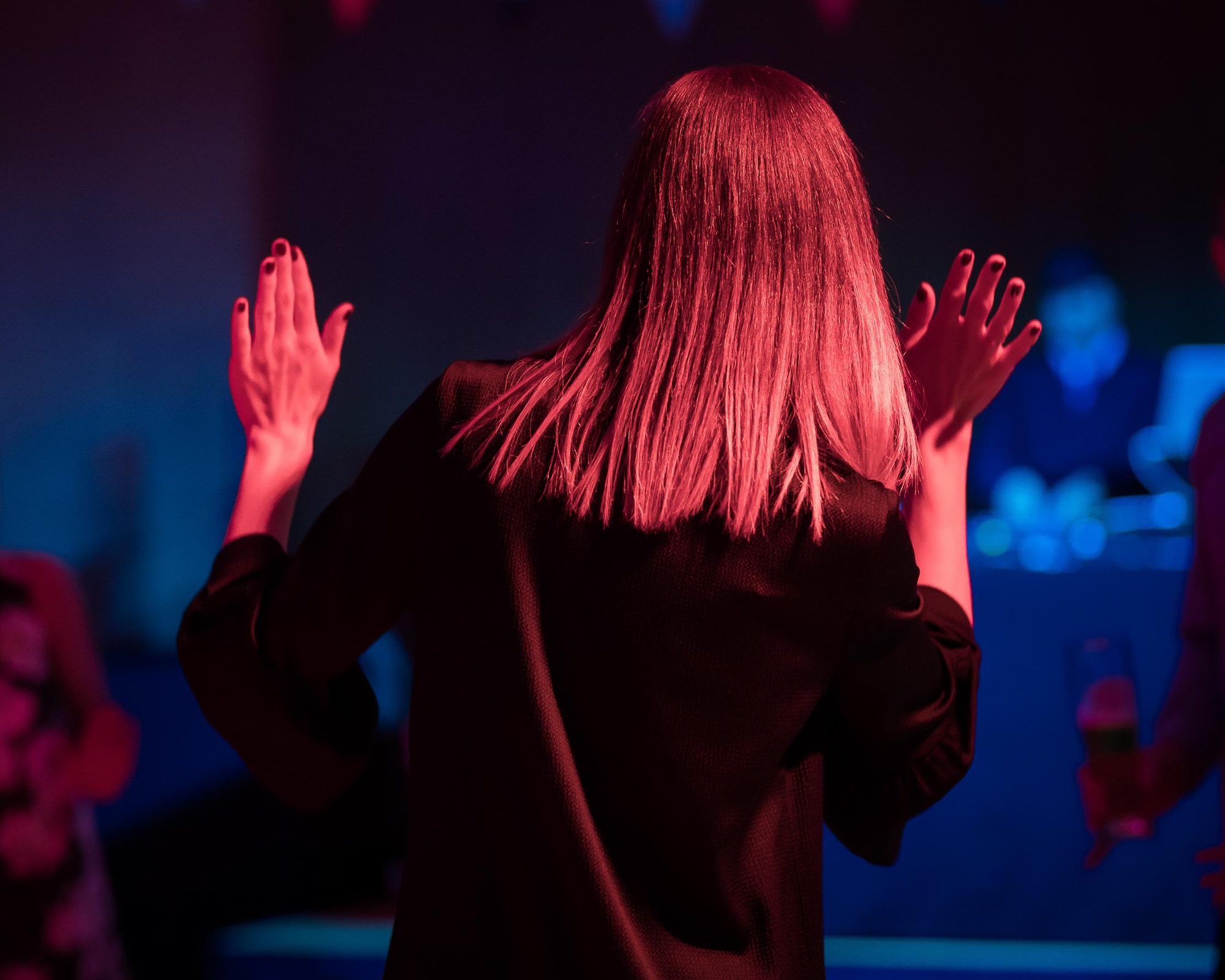 Woman raising hands