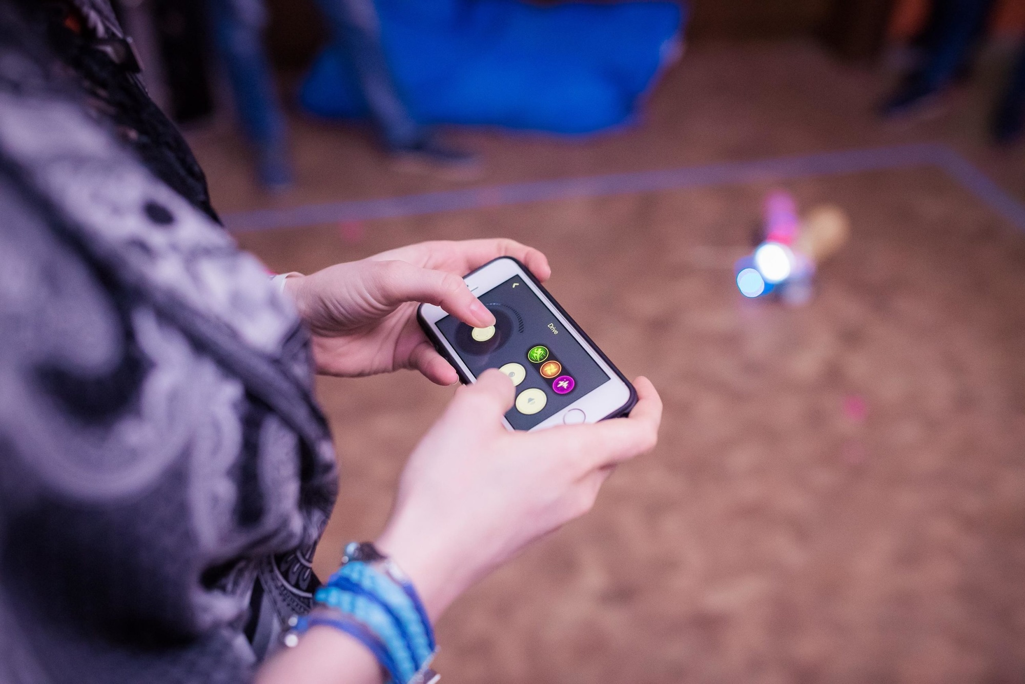 Leading a robot by using a phone