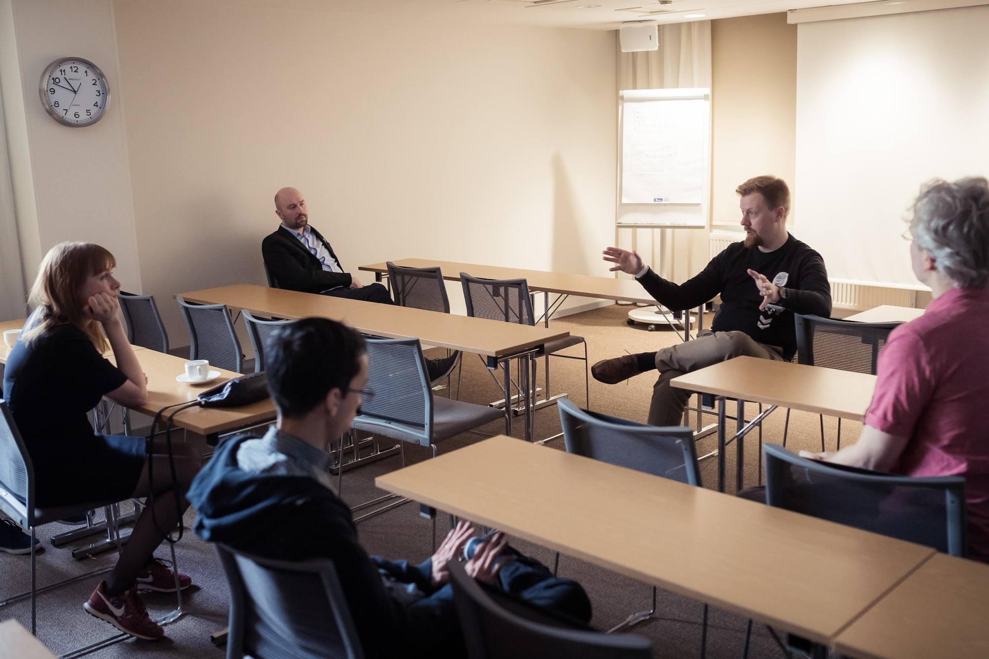 People discussing in a meeting room