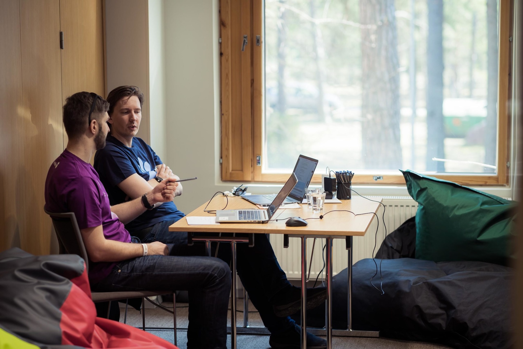 Two developers with laptops