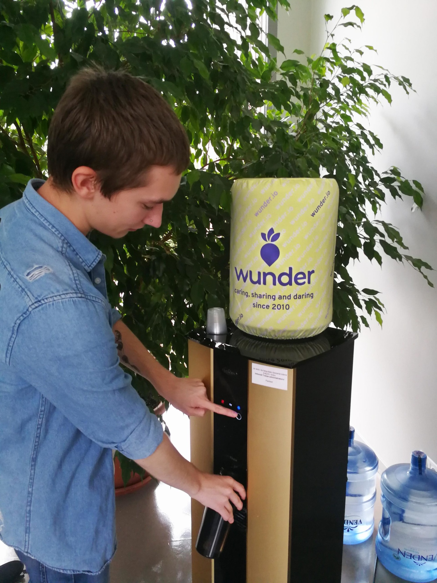 Student pouring water in bottle