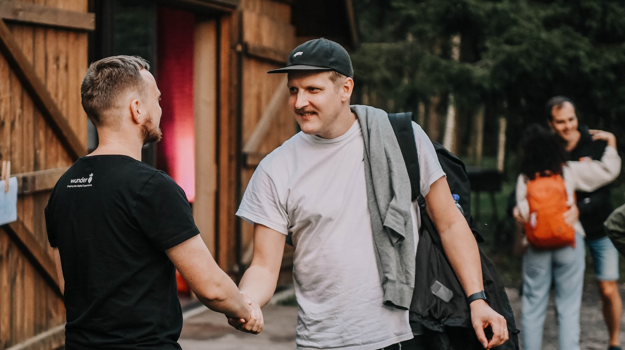 Two persons shaking hands