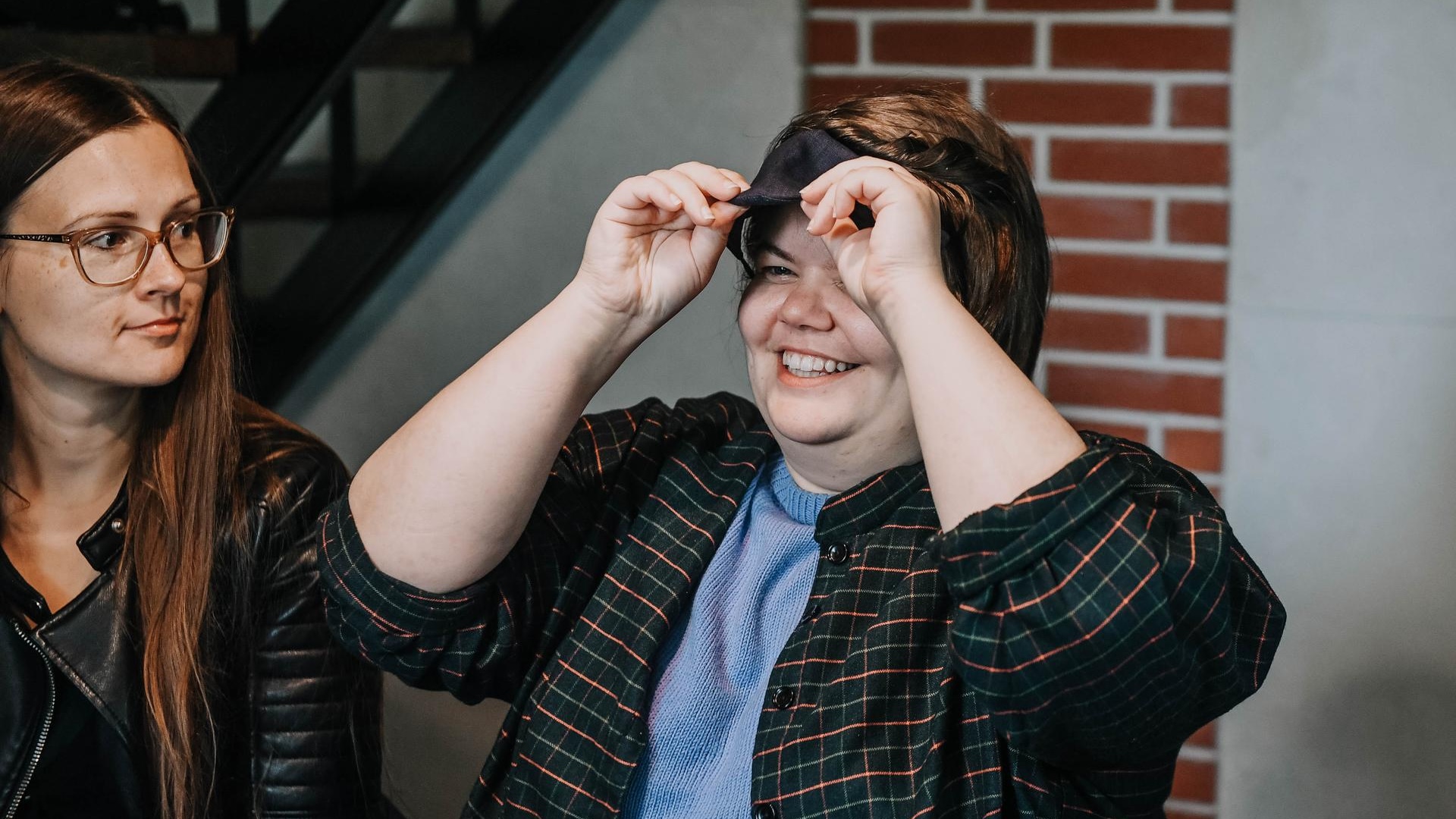 Person taking off the blindfold